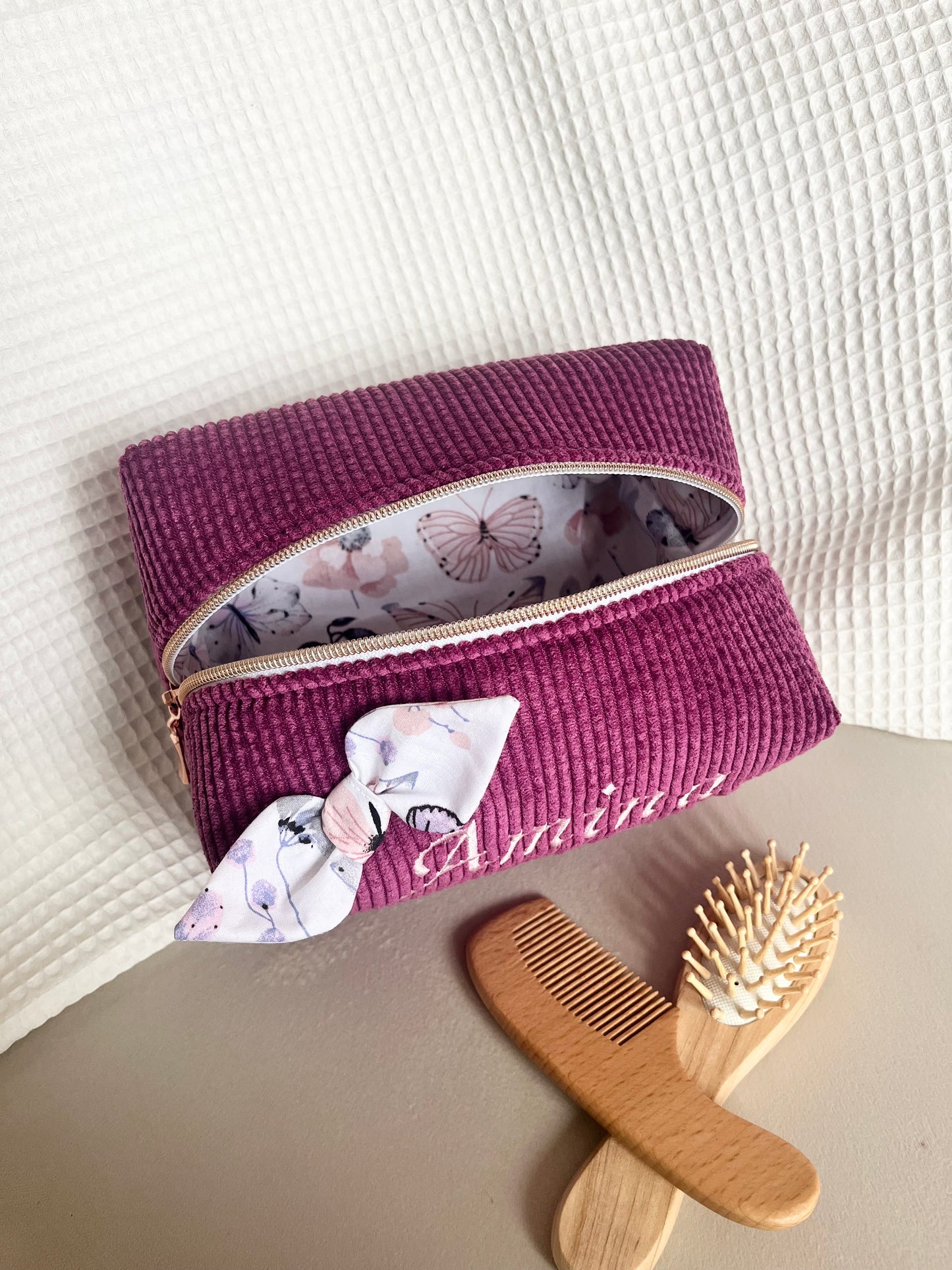 Burgundy floral toiletry bag